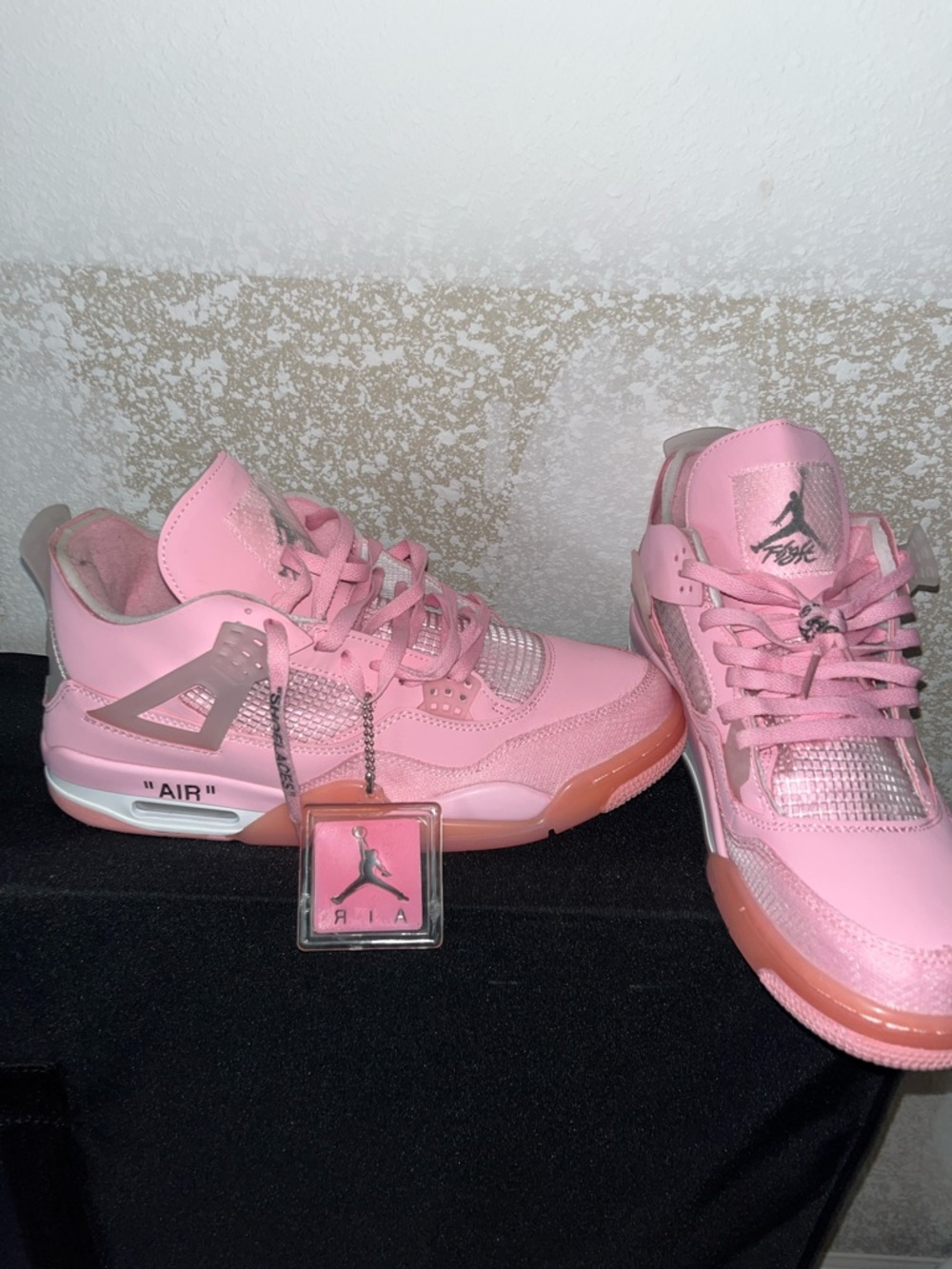 Jordan Pink Retro 4 Sneakers with Branded Tag